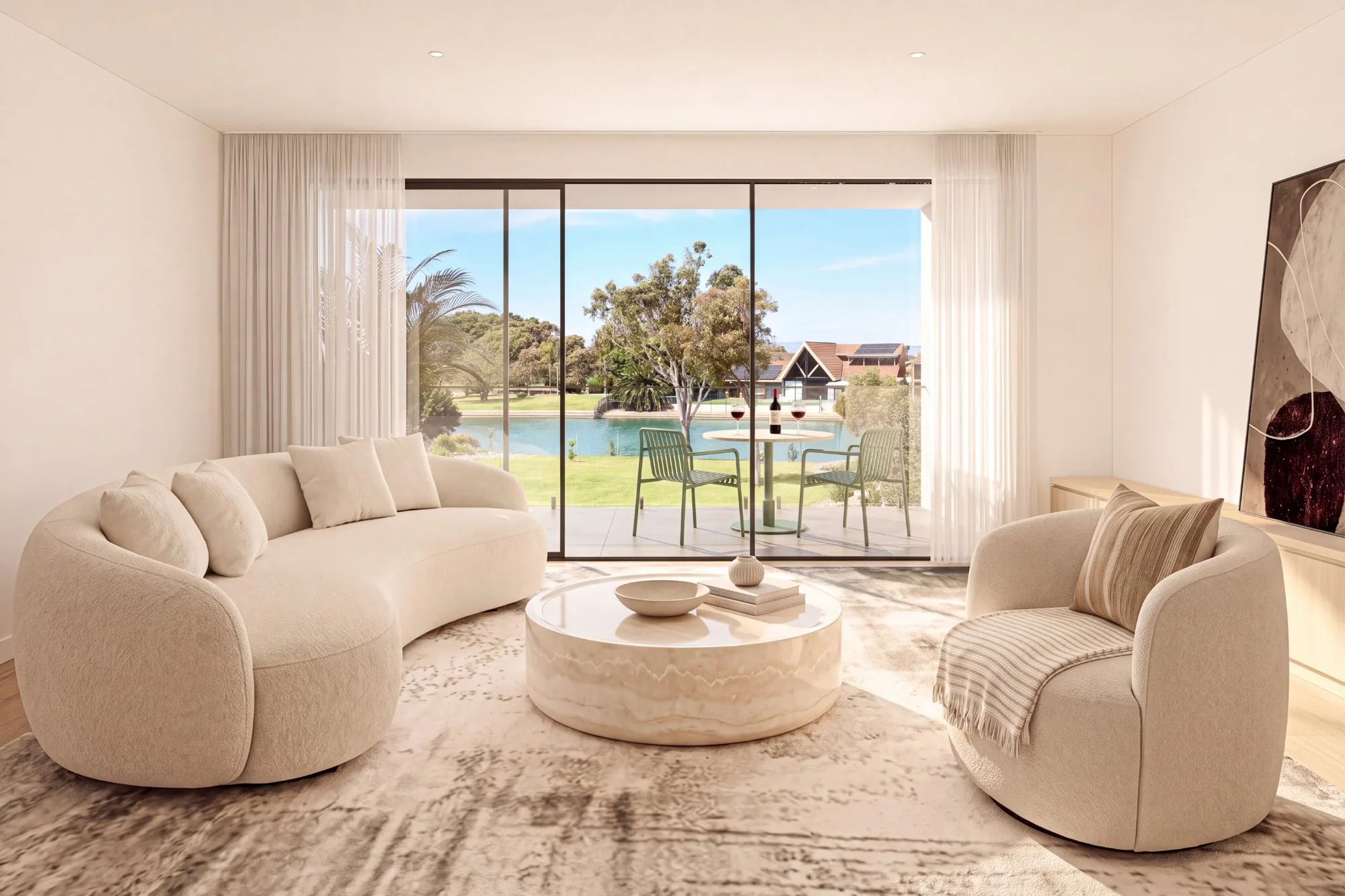 Upstairs lounge opening through full-height glazing towards the water